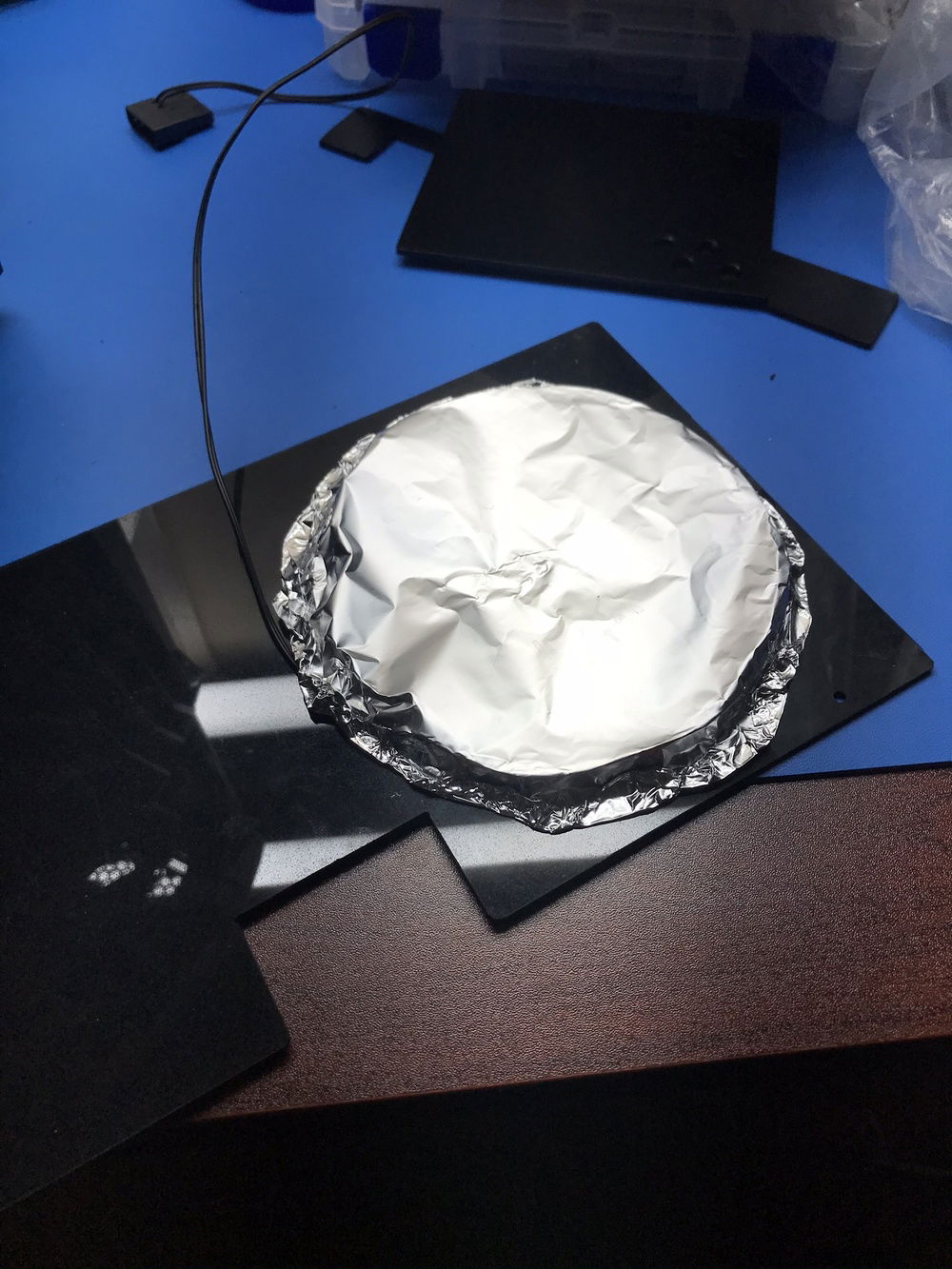 Cheap solution. It looks ghetto but it worked really well. The Avengers panel got about twice as bright. Hard to tell in the pictures of course. I was a little concerned about heat so I let it run for several hours closed up in the case and it never got too hot to touch.