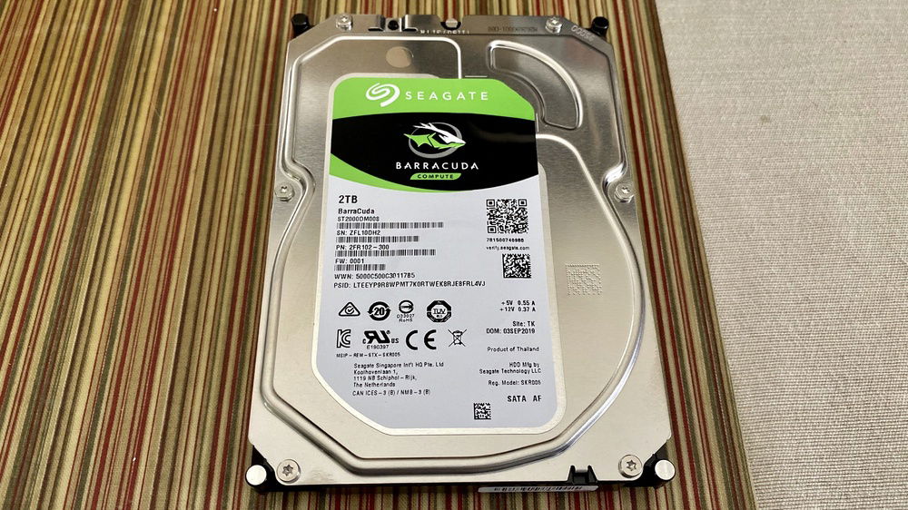 The 2TB platter drive. I'm surprised at how thin this is compared to my 8TB drives. It's about half the thickness.