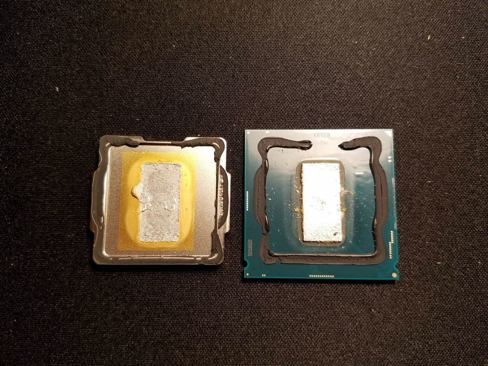 Heatspreader removed and stock soldered TIM exposed.