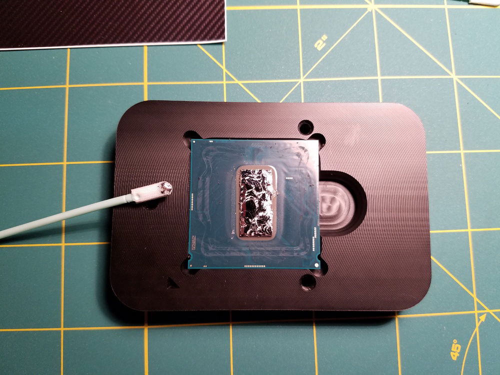 Cleaning the stock soldered TIM off the CPU is extremely simple when using the Rockitcool Quicksilver kit. Just takes time and patience.