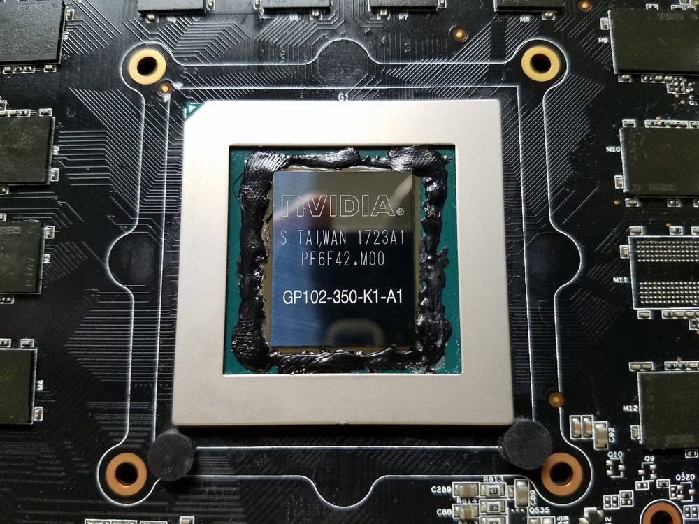 Applied liquid electrical tape around the die to protect from accidental liquid metal TIM spills/running.