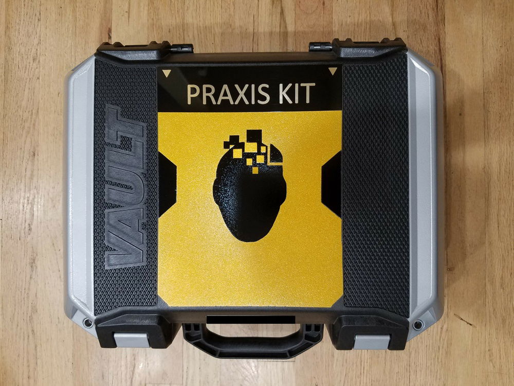 "Praxis Kit" plate and my personal contact information in case it's ever lost during travel.