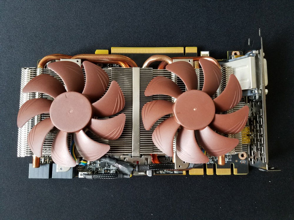 Noctua fans removed from the stock frame and attached to the GPU heat sink. Wires soldered and well hidden from view.