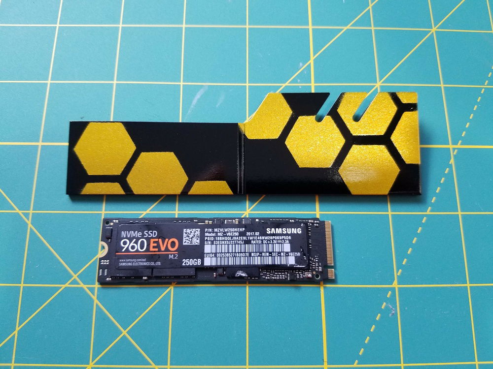 I reused the GPU back plate stencils for the design. Double sided thermal tape will be used to attach the heat spreader to the M.2 drive.