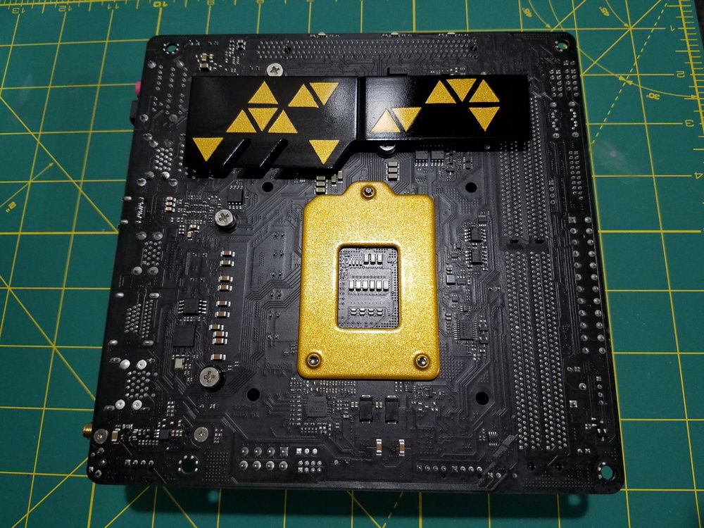 I painted the motherboard CPU back plate as well as opted for the alternate M.2 design.