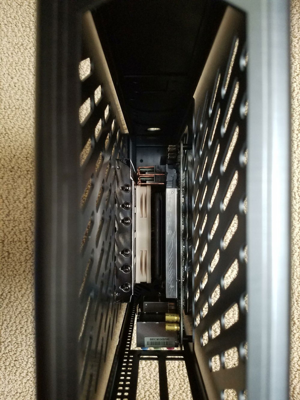 The stock case dimensions aren't enough for the Black Ridge cooler to fit without making contact with the side panels. Since this build is designed with travel in mind, I need to find a solution to prevent metal to metal contact and undesirable strain on the CPU and Black Ridge cooler.