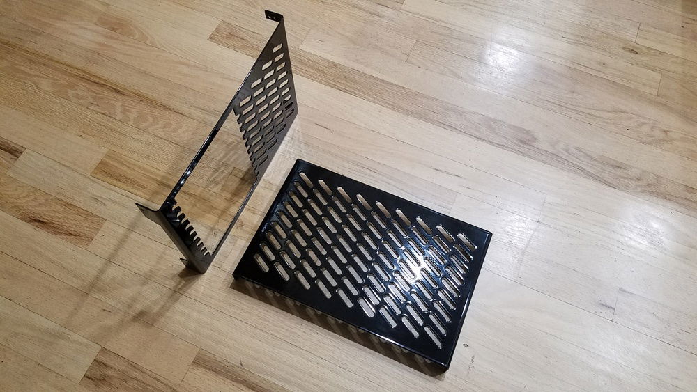 Side panels after powder coating.