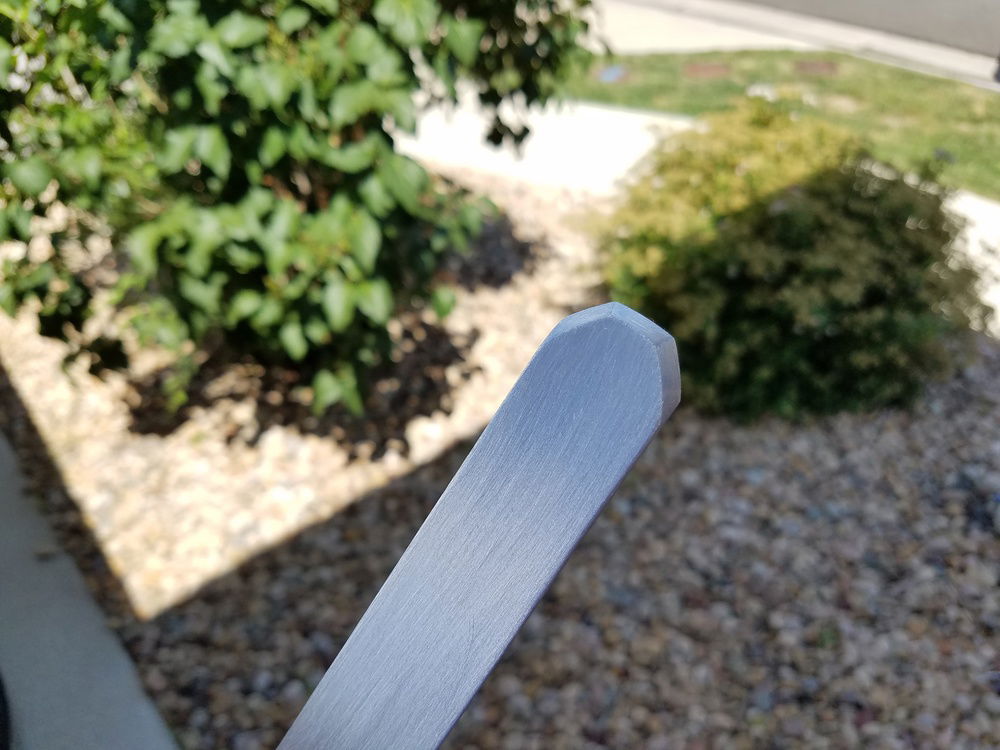 Aluminum cut and sanded.