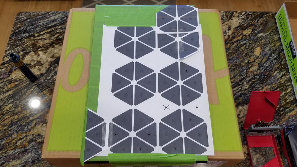 I used a stencil to finalize the placement to drill the necessary holes in the case panel.