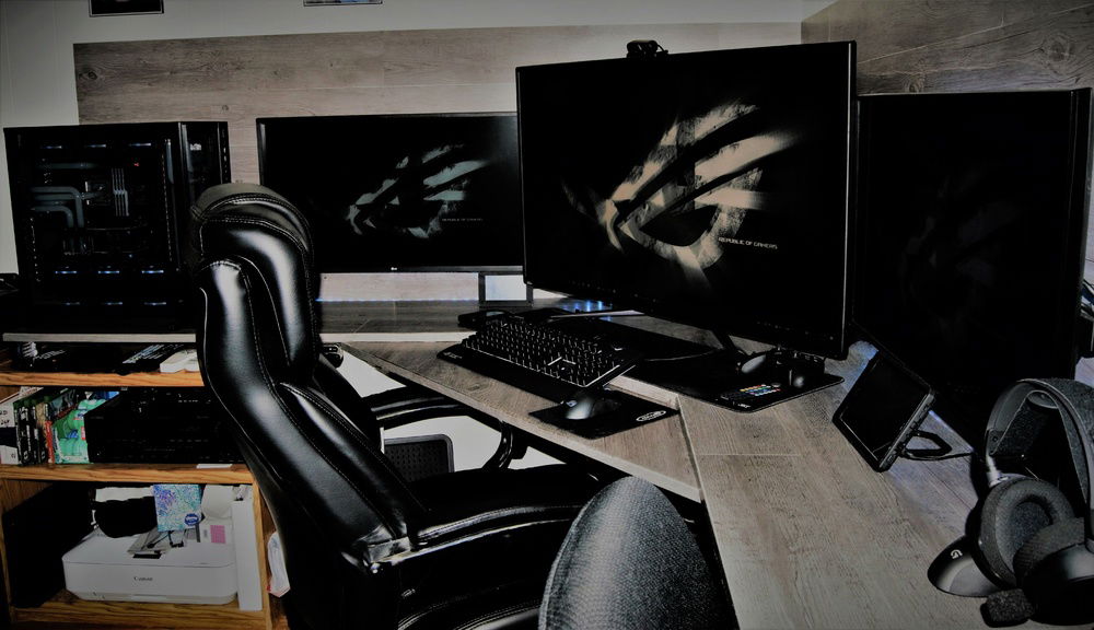 My setup. Was all 32" monitors but added this 43" ASUS ROG Swift PG43UQ 4K 144Hz into the mix.