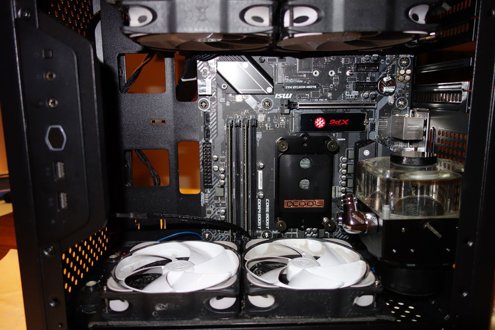 the process of testfitting (now with the actual parts) took quite a while since the case's hole design allows for so many possibilities, but at the same time many of them would not work with all parts assembled. so it is a lot of trial and error in the beginning.