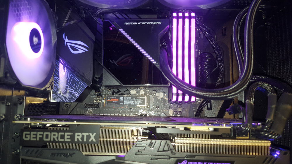 AIO, memory and system M.2 drive with tempered glass removed.