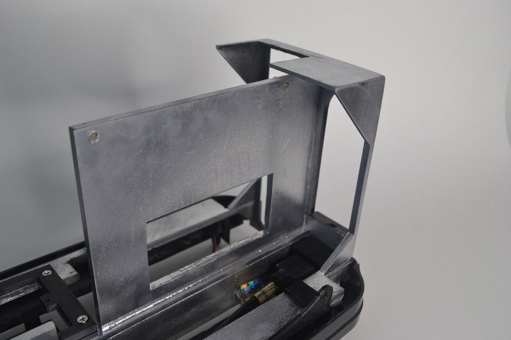 The extender cord to the power supply is routed beneath the graphics card.