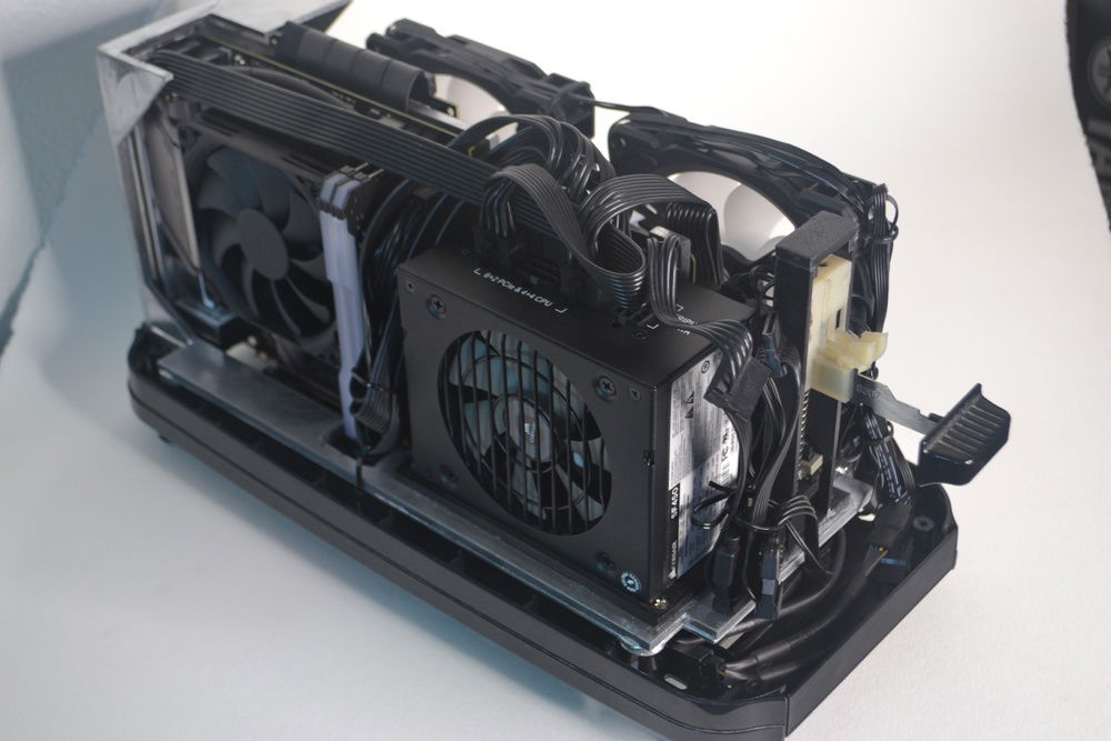 You might notice that on the very front bottom there's a 3D printed piece. I wanted to add a couple USB ports there, and I did design a piece that would hold the hardware, but the cabling ended up being too much for it to fit so I had to go with a blank one instead :(