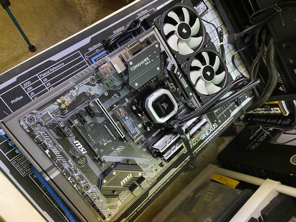 Corsair H100i Pro added to the motherboard. Next step getting this little lot in the case.