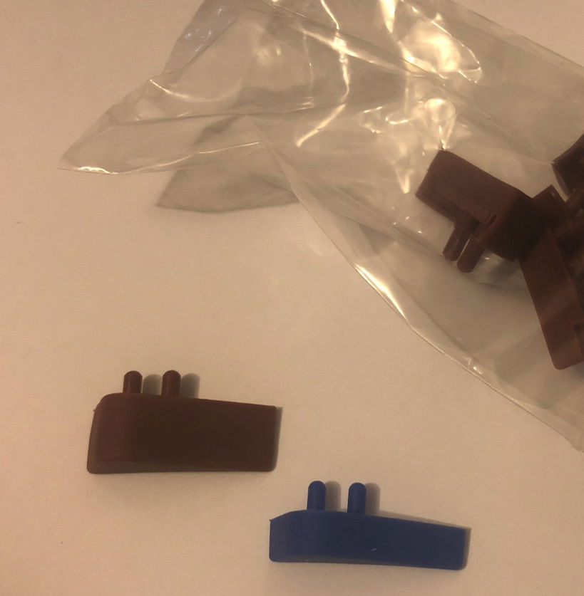 You can see the difference between the included brown thicker pads vs. the thinner ones. The thick brown ones are included with the cooler. The NF-A15 HS-PWM fans include only the thin ones.