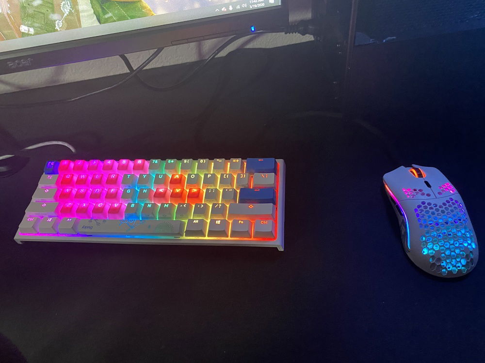 ducky one 2 mini, with Glorious model 0, with tai hao rubber pink keycaps