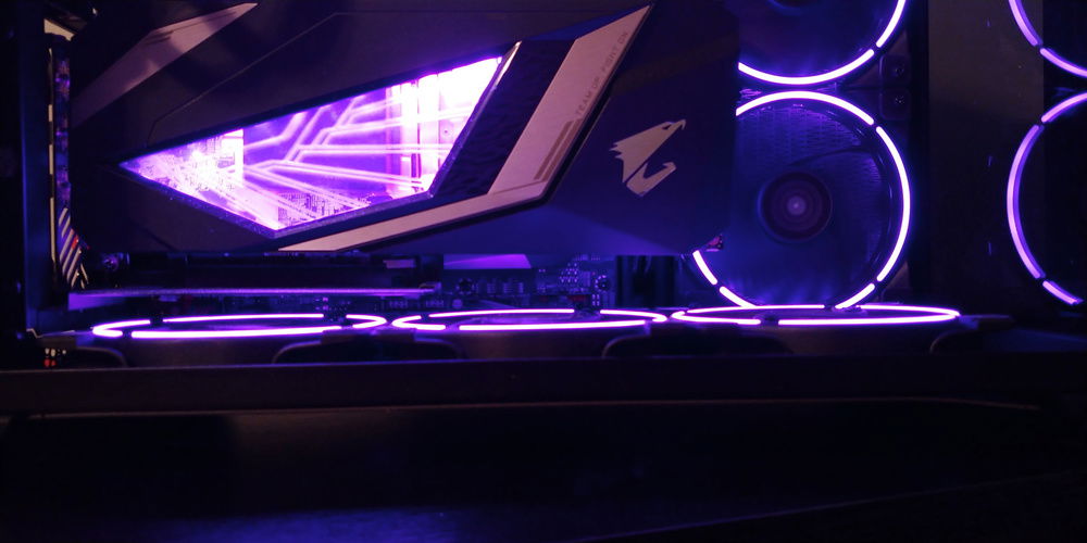 The CoolerMaster vertical mount provides enough clearance for the bottom case fans, though it does almost completely cover the one on the far left. While this doesn't directly affect temps, it does add a little more noise to an already fan-heavy build.