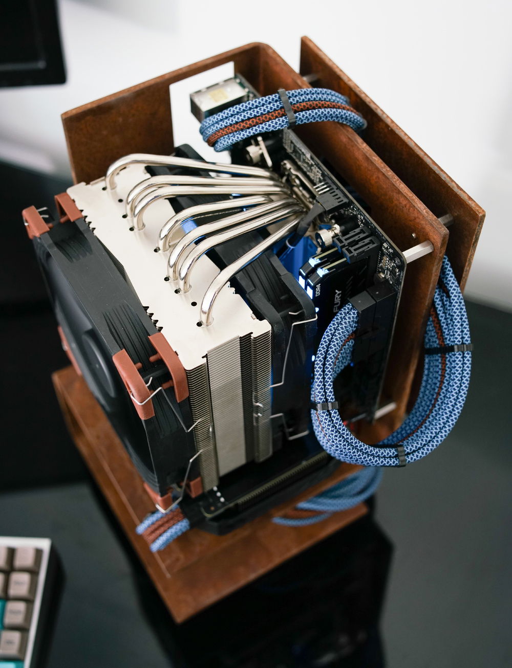 The Noctua C14s was tricky. If you want to have the pipes vertical you need a GPU with a back plate because the tips of the heatpipes touch the back of the GPU. With the MSI Aero cards, The GTX cards (1660 etc) don't come with a back plate unlike the RTX cards. I also had to swap out the Corsair Vengeance PRO RGB with lower profile HyperX RAM because the Corsair RAM is too tall, (for dual fan config). Finally, with this ASRock motherboard, you can't orient the C14 sideways like you might be able to on some other ITX boards as the heatsink interferes with the IO side of the case.