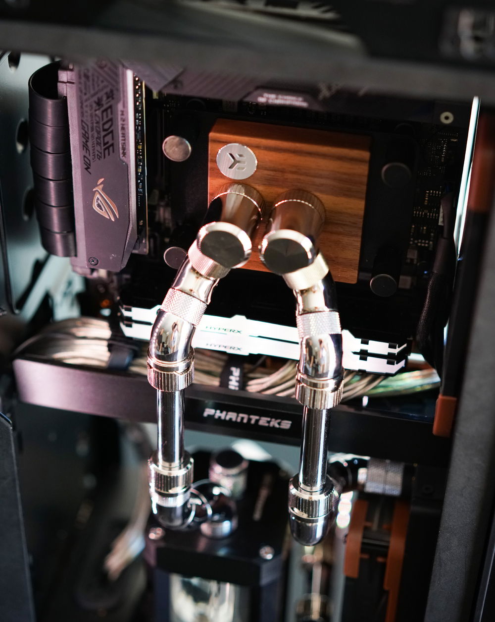 The Ryzen 9 3900x is an amazing cpu. The ASUS ROG x570 itx motherboard looks great with the EKWB Lignum Water Block. The motherboard did need a bios update and some tuning to make the stock voltages appropriate for the system.