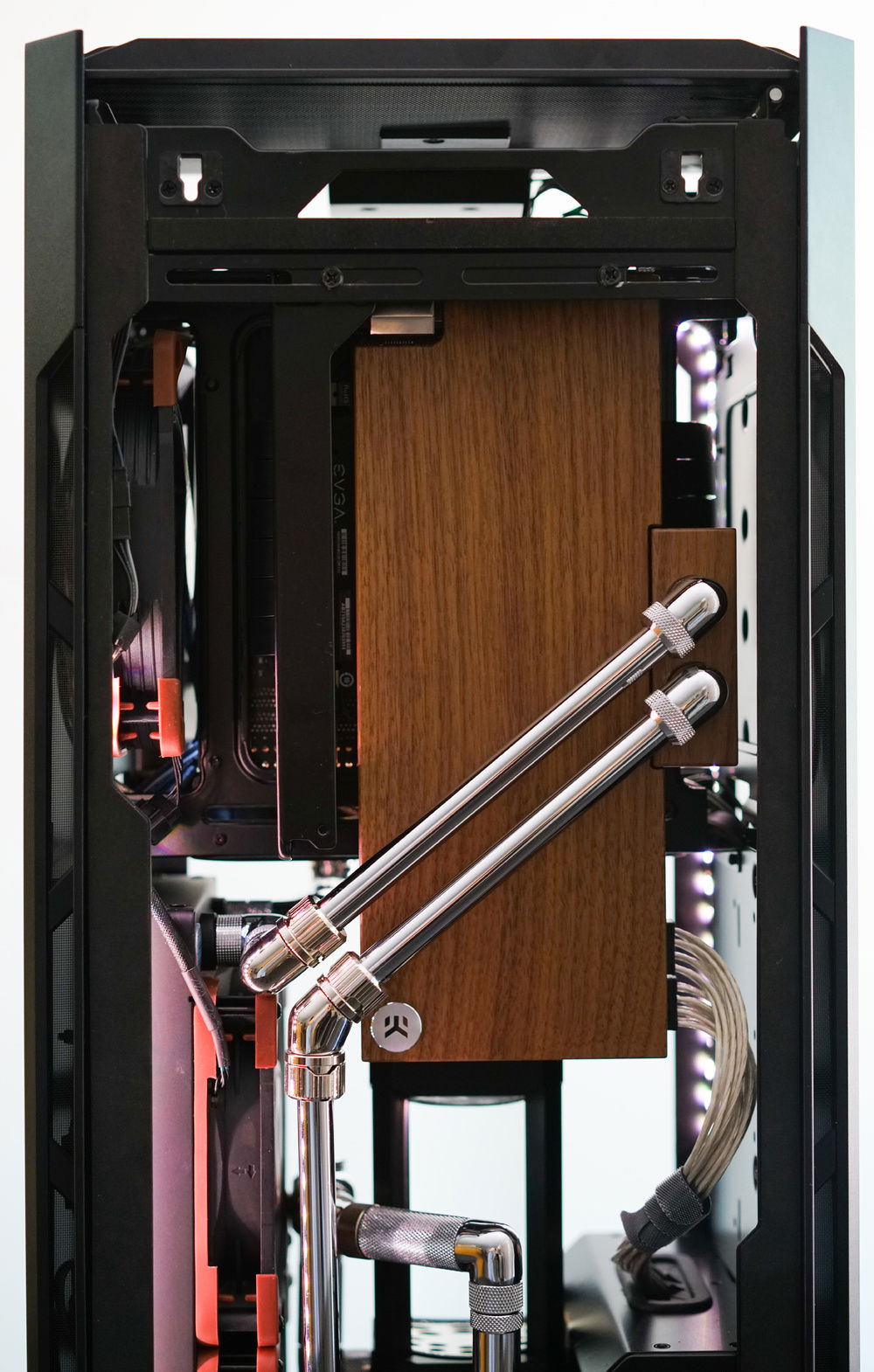 Parallel lines. Nailed it. :) Although the cables aren't too visible in this case with all the out of sight routing options, the @mdpcx transparent 18AWG wire looks great unsleeved and saves a a lot of space in tight places. I debated putting cable combs on but ended up really liking the way it coiled into the PSU shroud organically. The fittings just fit under the glass with less than a mm to spare so choose your fittings wisely.