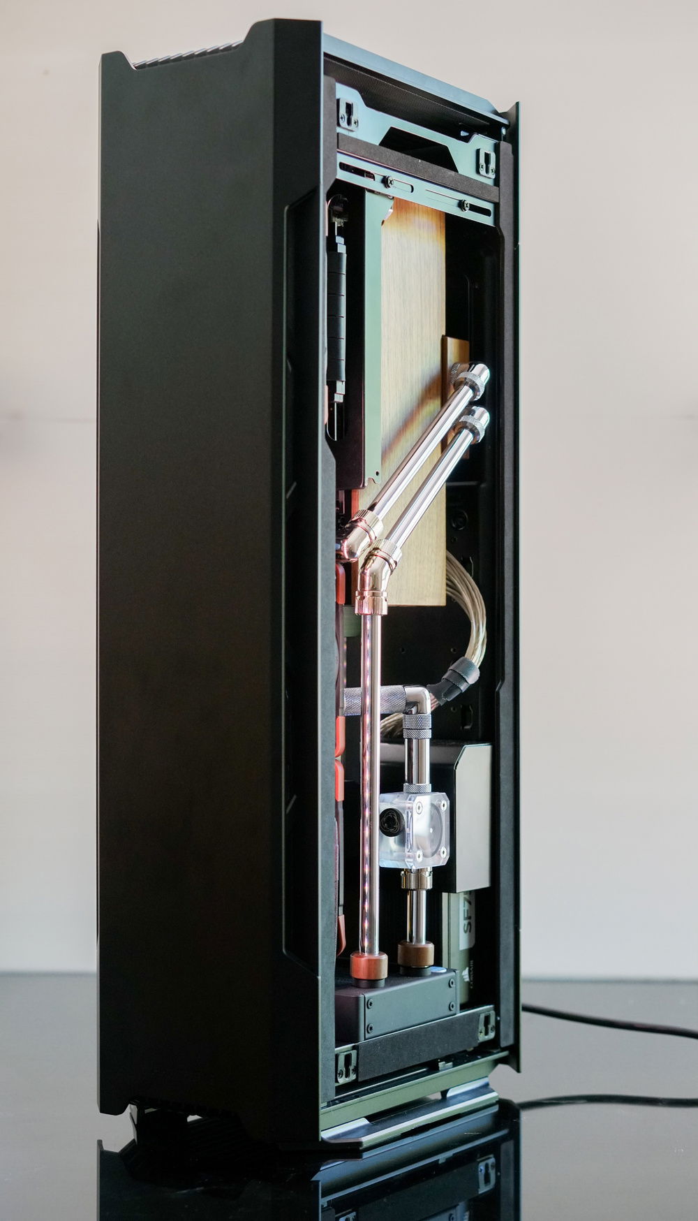 There isn't enough clearance with the Lignum GPU block and back tempered glass panel. The solution was to remove the Lignum GPU block port collars. After that the EK Torque fittings still couldn't fit so I swapped them out for EK Classic. But the EK classic fittings were 0.5mm too wide in diametre to fit into the GPU block port hole after you removed the collars. In the end I had to use Barrow fittings and shave a little wood off the inside of the port recess.