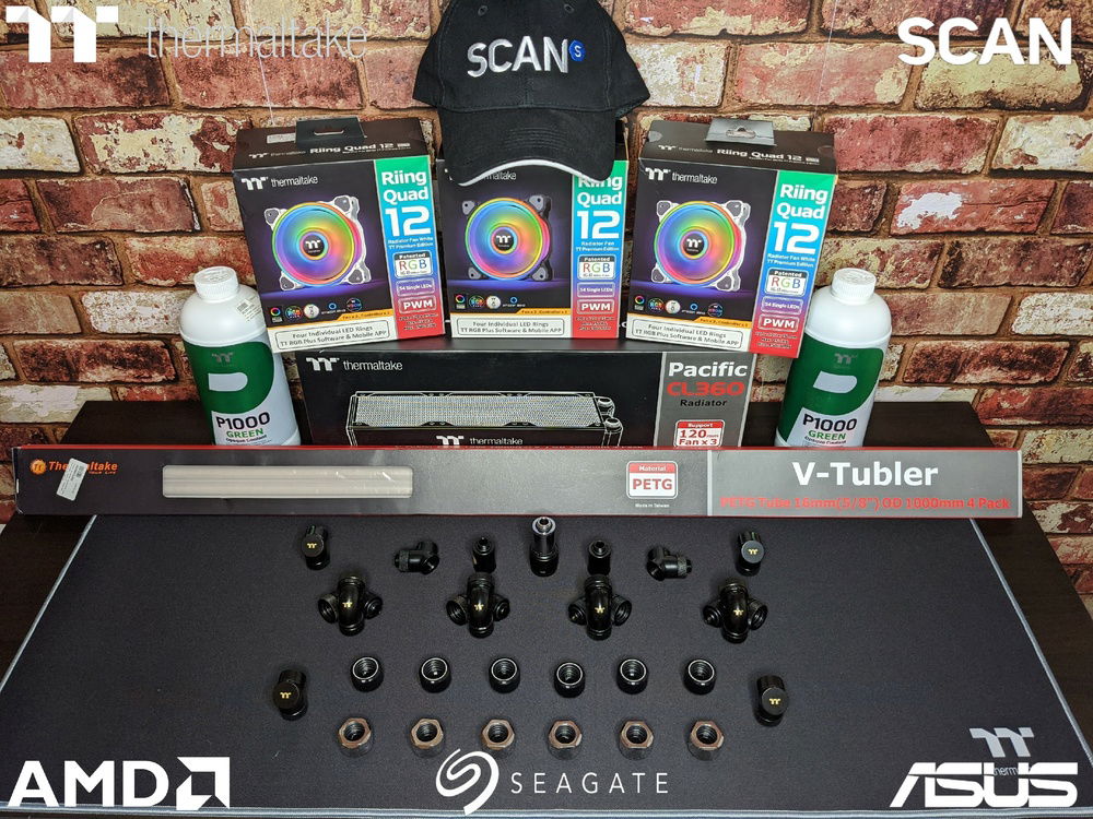 More parts! Lots of fittings, tubes, a fat rad, green coolant and 12 bodacious fans.