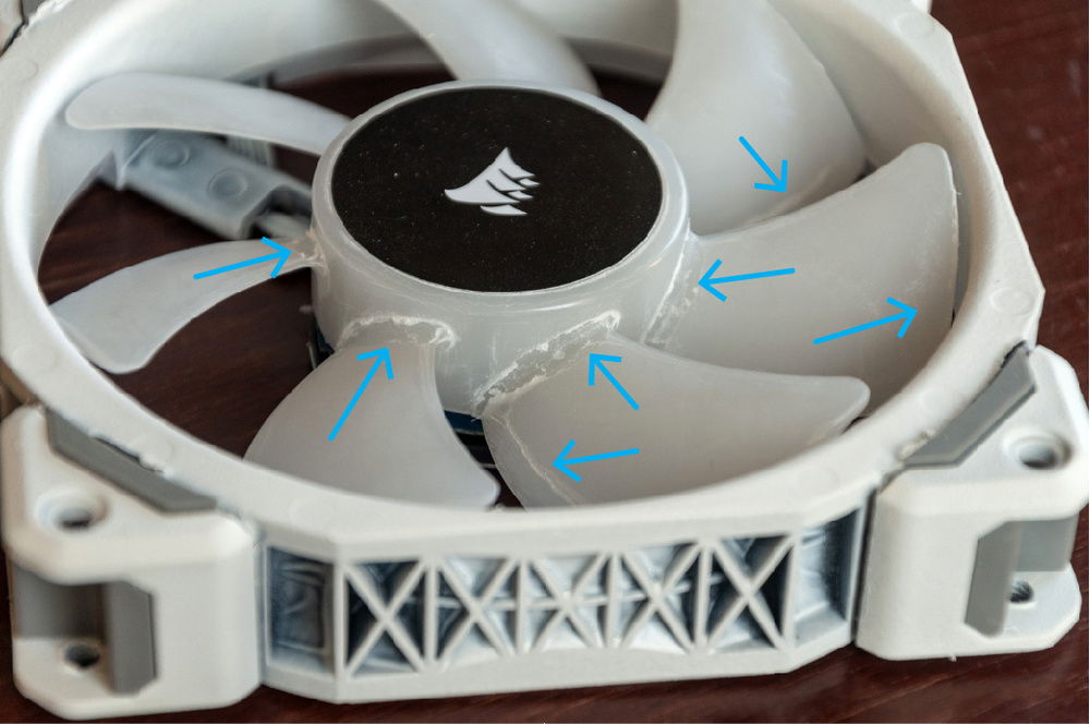 PSA: Make sure to check what solvent your spray paint has and whether the plastics you are spraying can deal with the solvent. I bought 8 fans from one store and 1 fan on discount from a different store. This fan was likely from a different batch and Corsair probably changed something about their plastic composition between these batches. The spray's solvent has eaten into the rotor quite a bit.