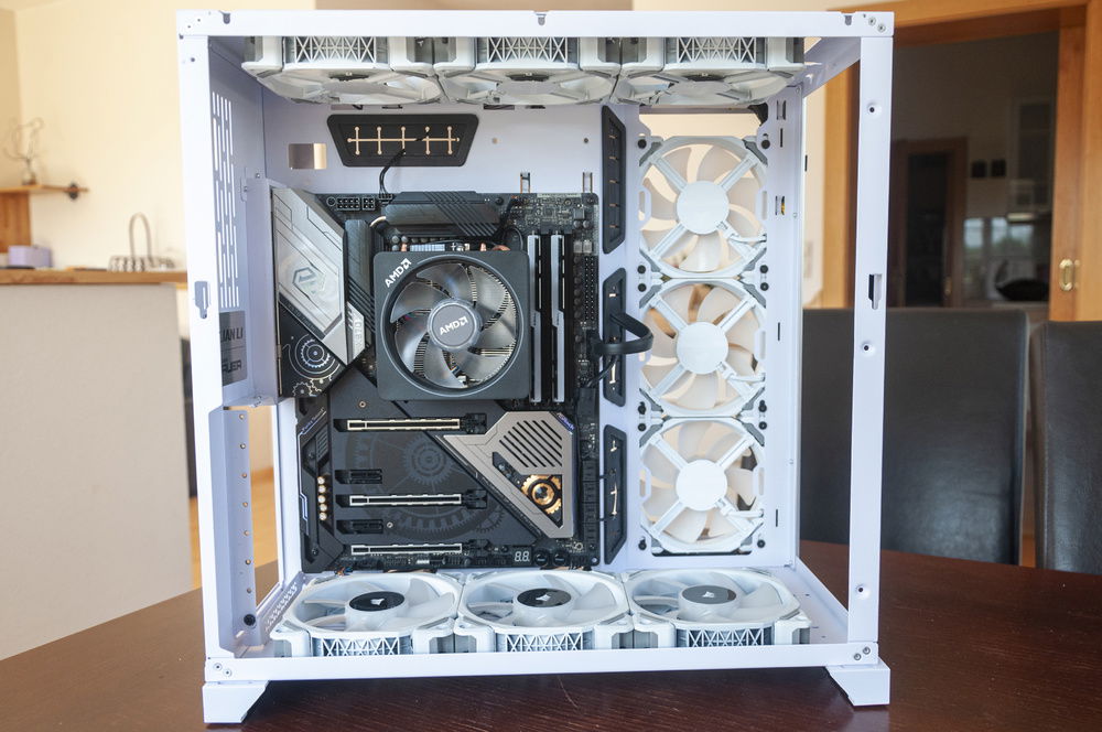 I plugged the front panel cables and the fan cables in first. I could route some of the fan cables between the SATA ports to make things extra-clean!