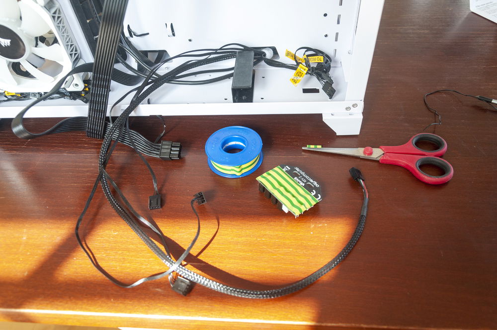 The contacts on the back of the Splitty should not touch any electrical components. Just to be safe, I put some electrical tape on them.