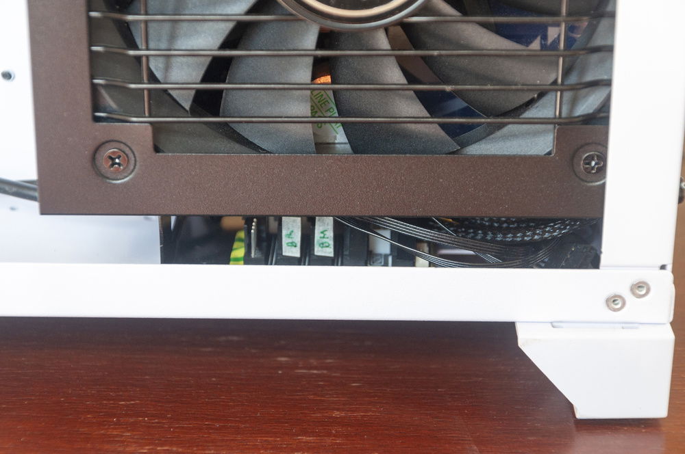 It fits really nicely under the PSU.