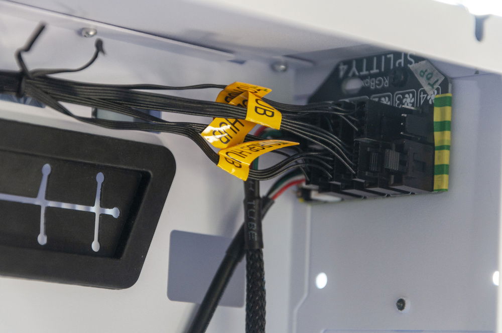 Once the Splitty's were populated, I started mounting them back to their original positions. This will likely change once I have the Water Cooling stuff in because some of those components need to plug into the Splittys too.