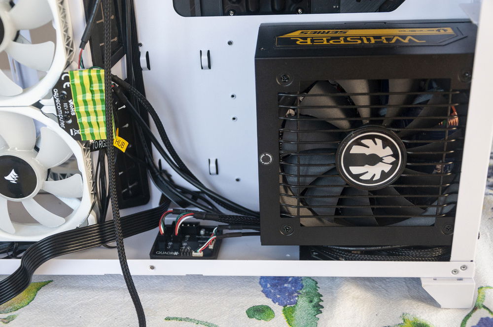 And are properly hidden under the PSU. Hopefully it won't get obnoxiously hot under there.