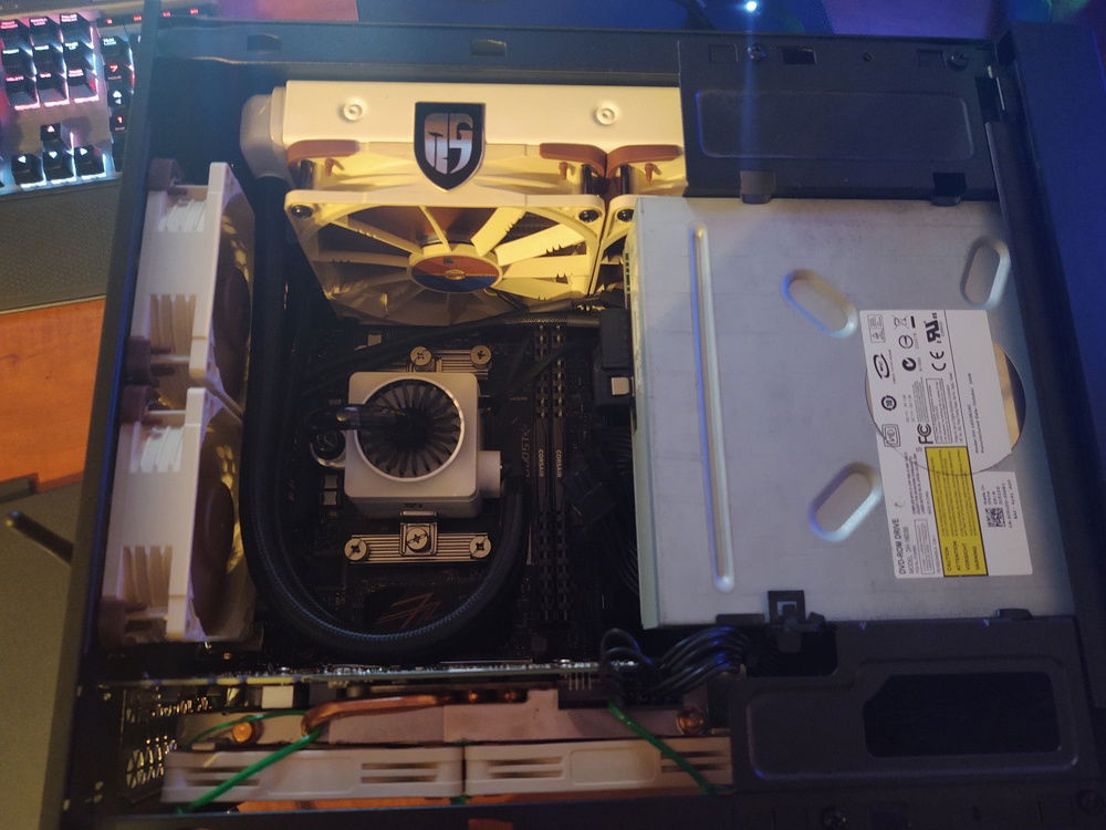 top view of cpu disk drive and gamerstorm aio
you can tell i didn't care about aesthetics and went for silence