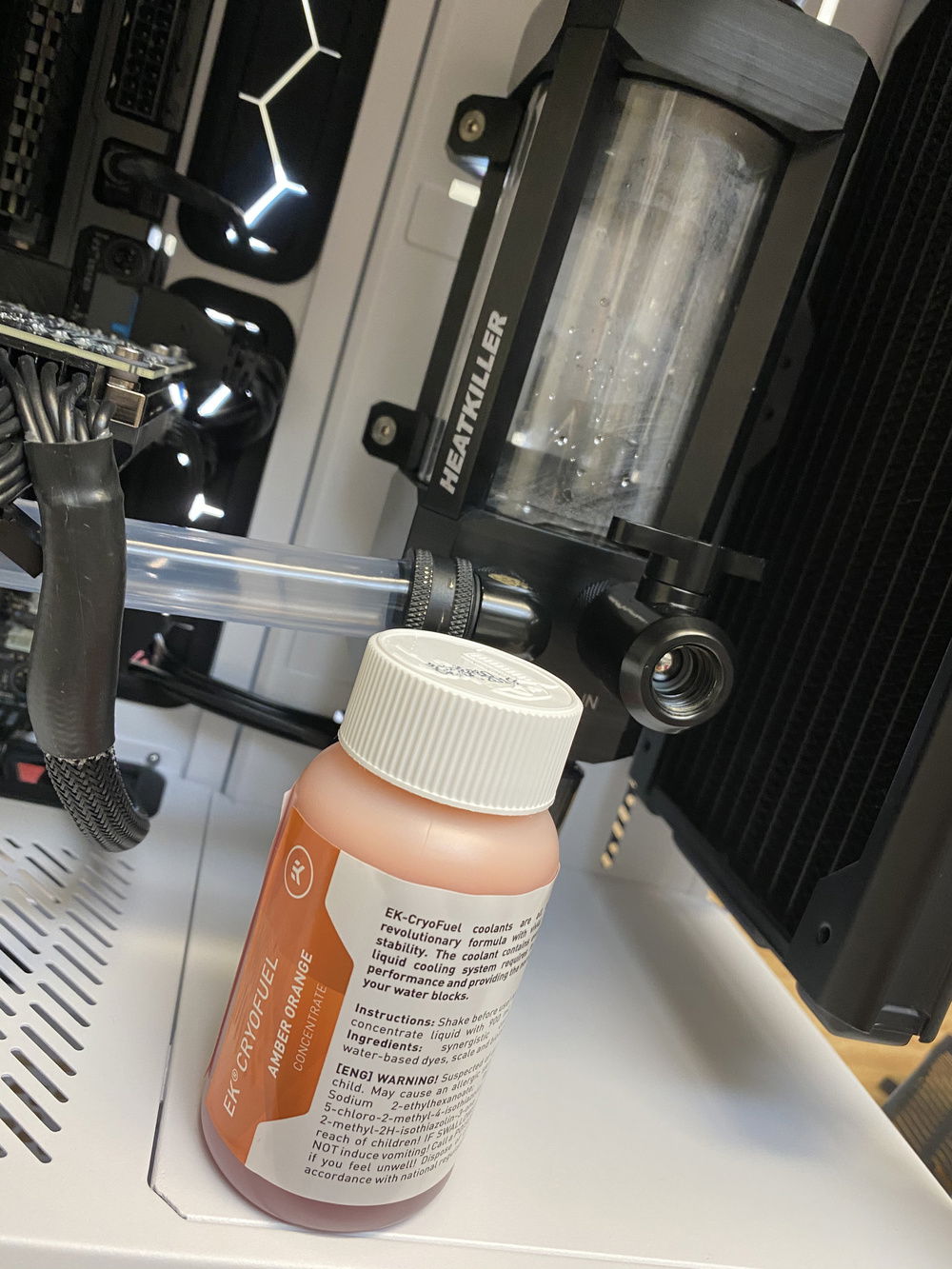 It is time to add the coolant! EK-Cryofuel Amber Orange Concentrate