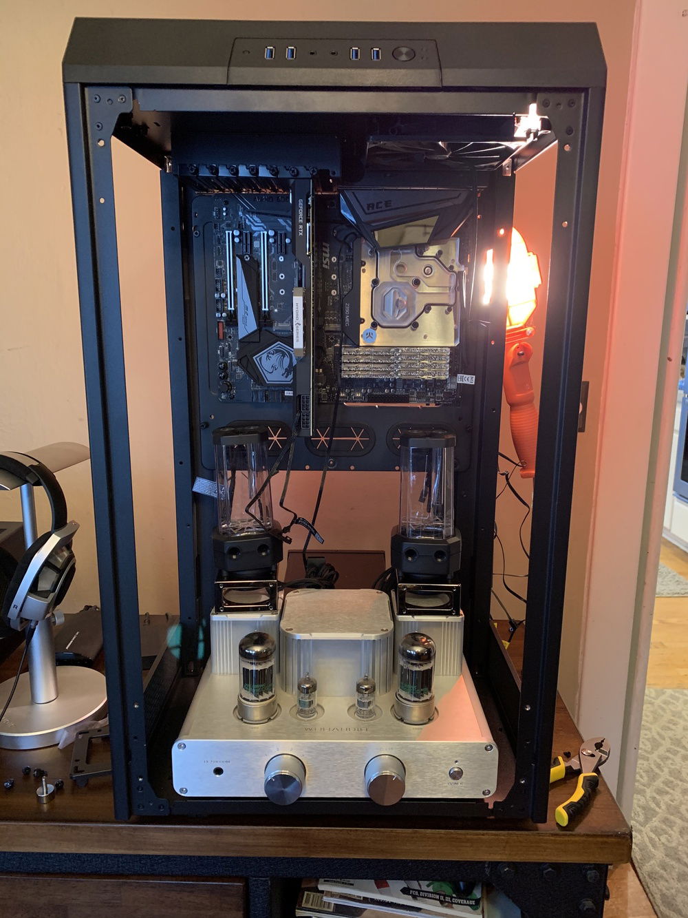 April 21 - Tube amp fits perfectly in the case and front glass panel will not interfere with amp controls. Will use fiberglass to cover the areas exposed due to removing the bottom face plate. Yes..this will work nicely……very nicely. *evil cackle*