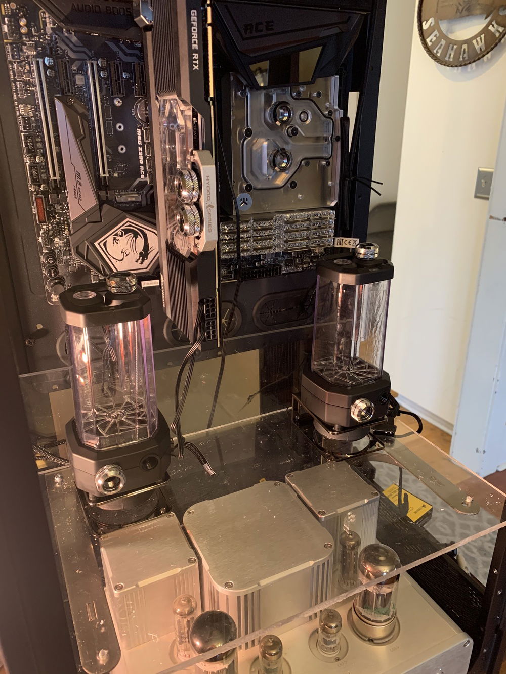 April 23 - Working on reservoir placement. Corsair (bitspower co-brand) fittings are starting to go in.