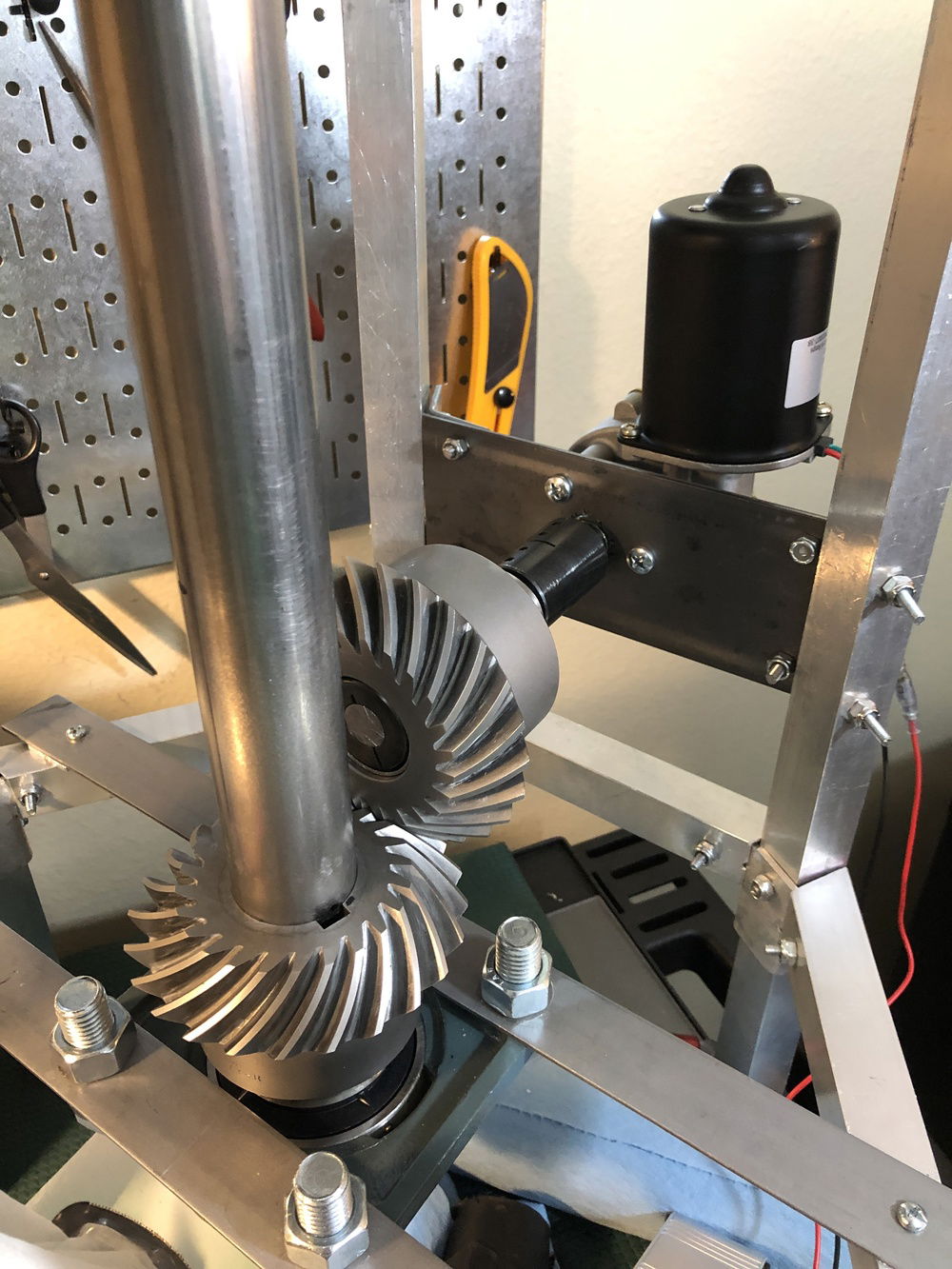 The spiral bevel gears that turn the center pole