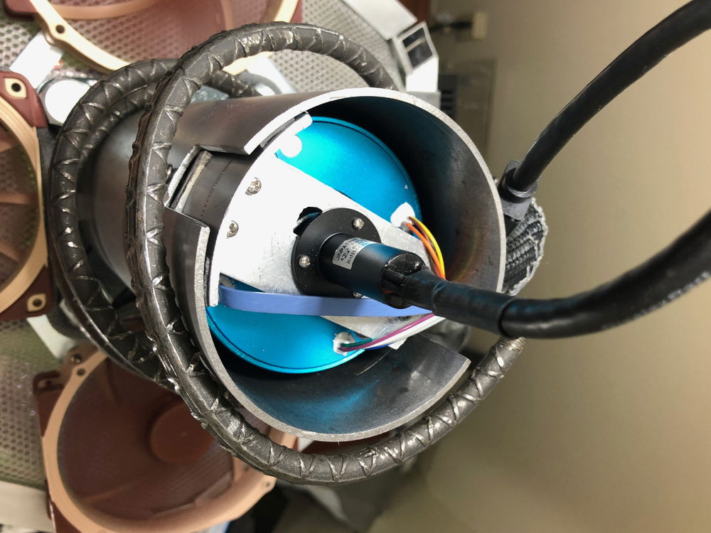 Birds eye view of the Ethernet/Signals and DisplayPort slip rings in their stabilizing stove pipe and corkscrew rebar accessory