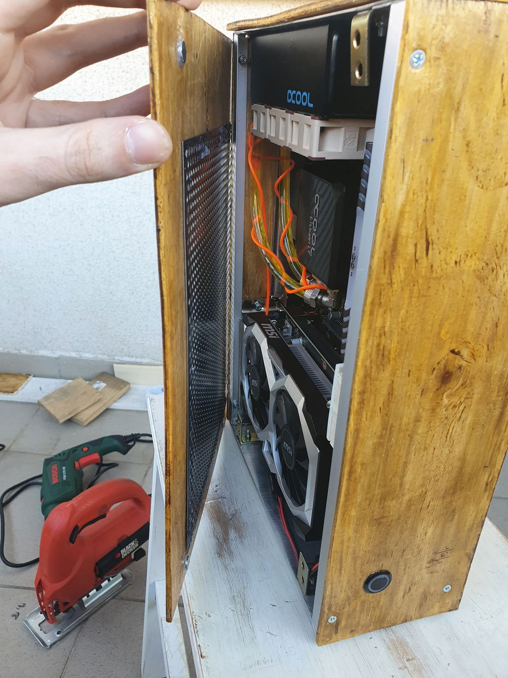 The side panel sits in place thanks to magic (just kidding, there's magnets involved)