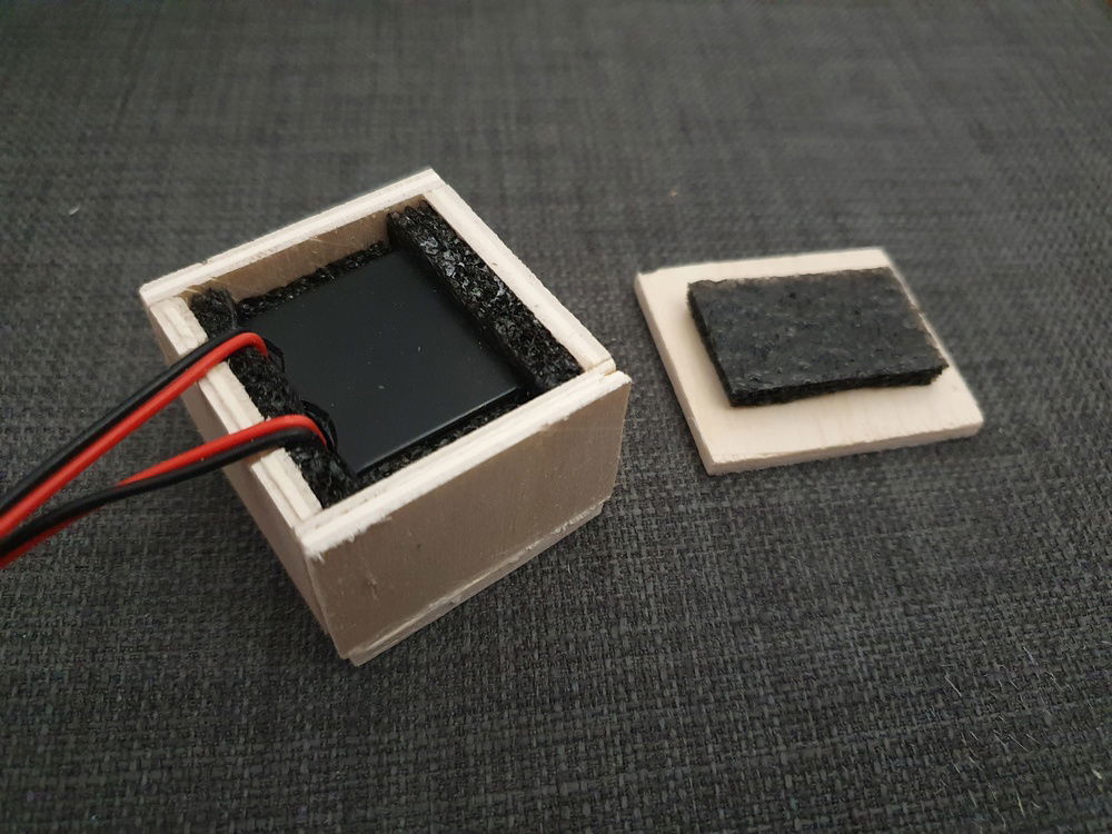 Wooden enclosure padded with sponge for the 12v driver as it makes the annoying pitch noise. The driver will power up the orange EL wire.