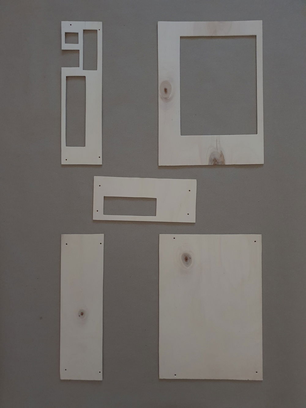 The wooden panels were all manually sawed and drilled.