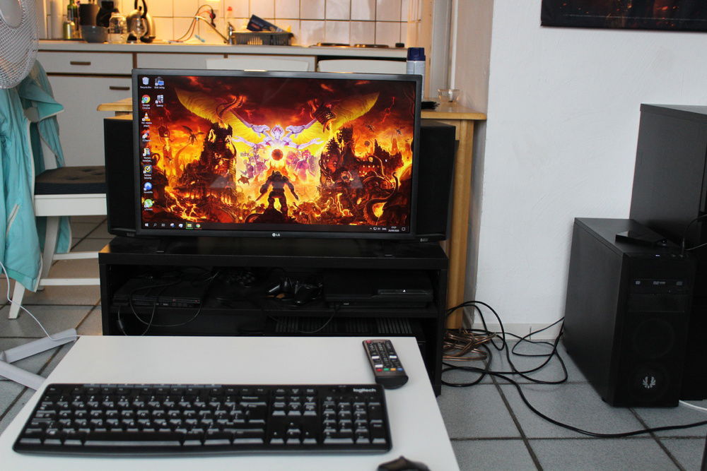 Setup with an LG 1080p TV and some old, really good speakers.