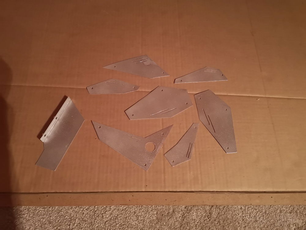 sheet metal pieces to cover up direct light from rgb (maybe gonna spray paint some pc components logos on them later?)