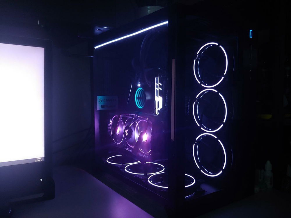 I had this kinda Blade Runner / Cyberpunk city alleyway lit by neon signs motif in my head. I think the edge lit case / GPU fans and the light ring on the AIO and the way the lights reflect on the inside of the glass achieved that pretty well. The lighting cycles between magenta/fuschia, purple, cyan, and a soft bright green.