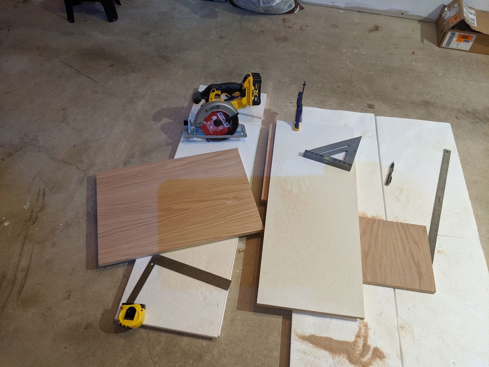 Here is my garage workshop, I had to make 3 cuts in the oak plywood to get the base and main motherboard tray. Lots of measurements and the cuts came out great.