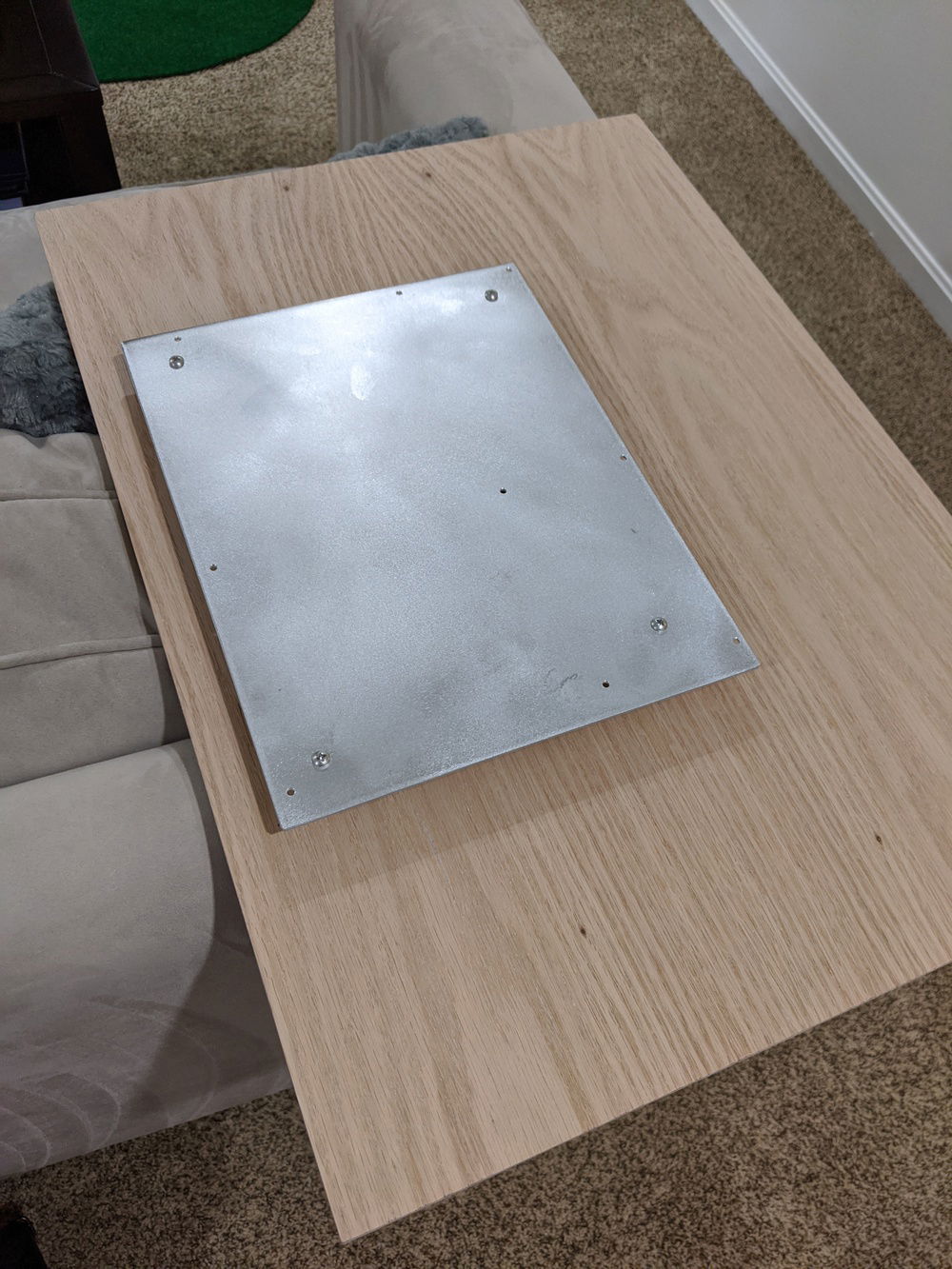 Made progress on the motherboard tray placement. I have it on 3/4 in spacers. I will route all of the cables through the gap.