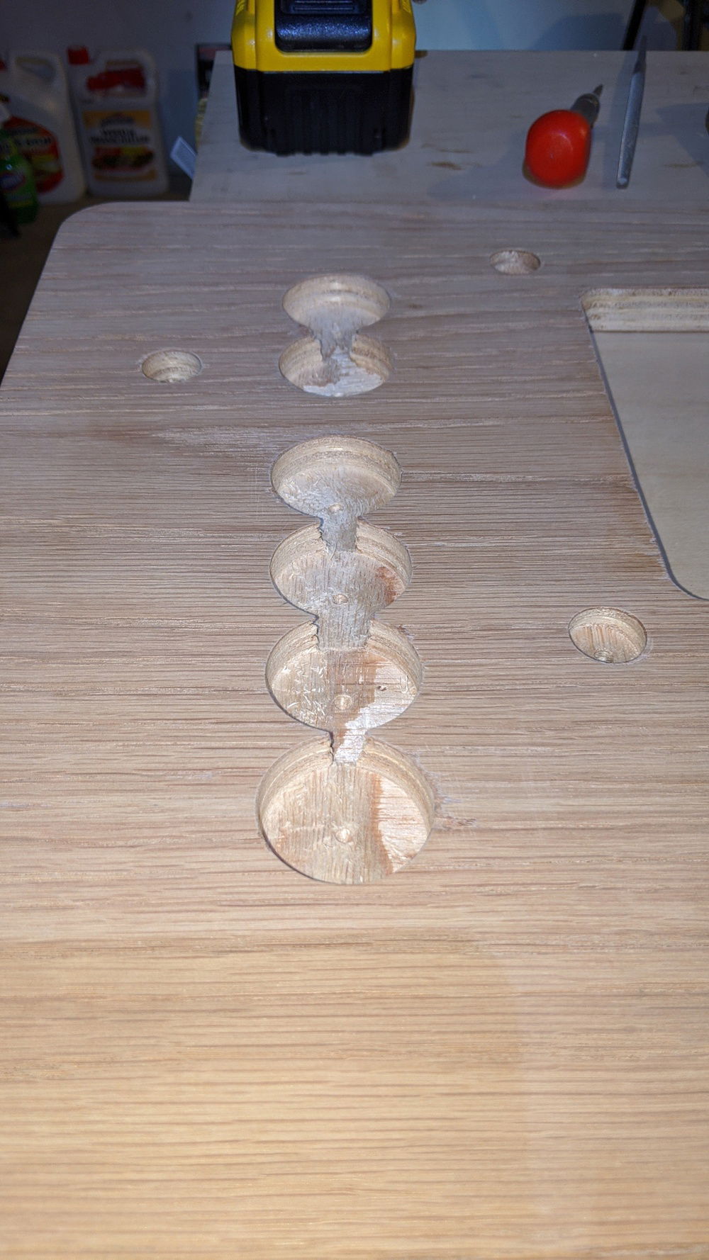 First set of holes drilled for the pass through fittings.