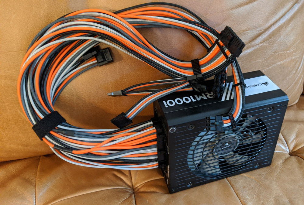 Cables are ready, CableMods, pro cables. I was going with a MCRN color theme. I think they will go well with the tones of the wood.