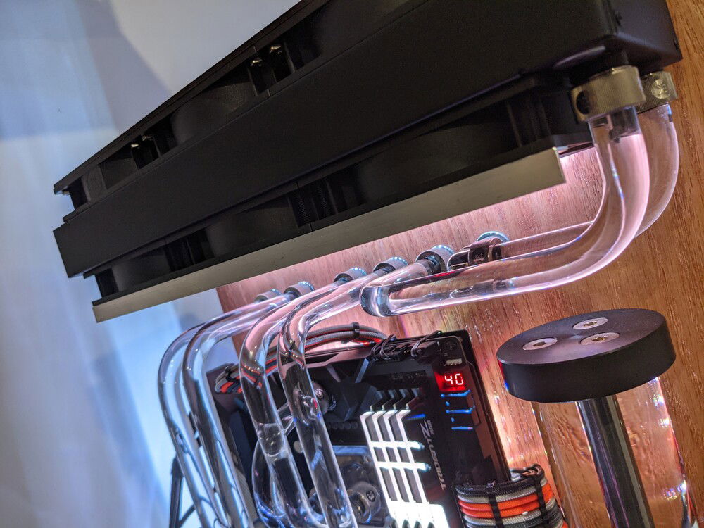 Added a RGB light strip. Used aluminum "L" bar from Lowes, painted black and screwed in with the radiator screws.